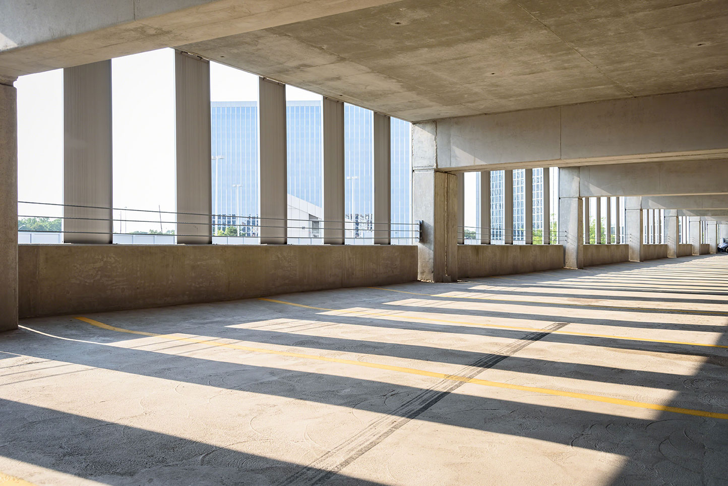 An empty parking garage during the daytime.